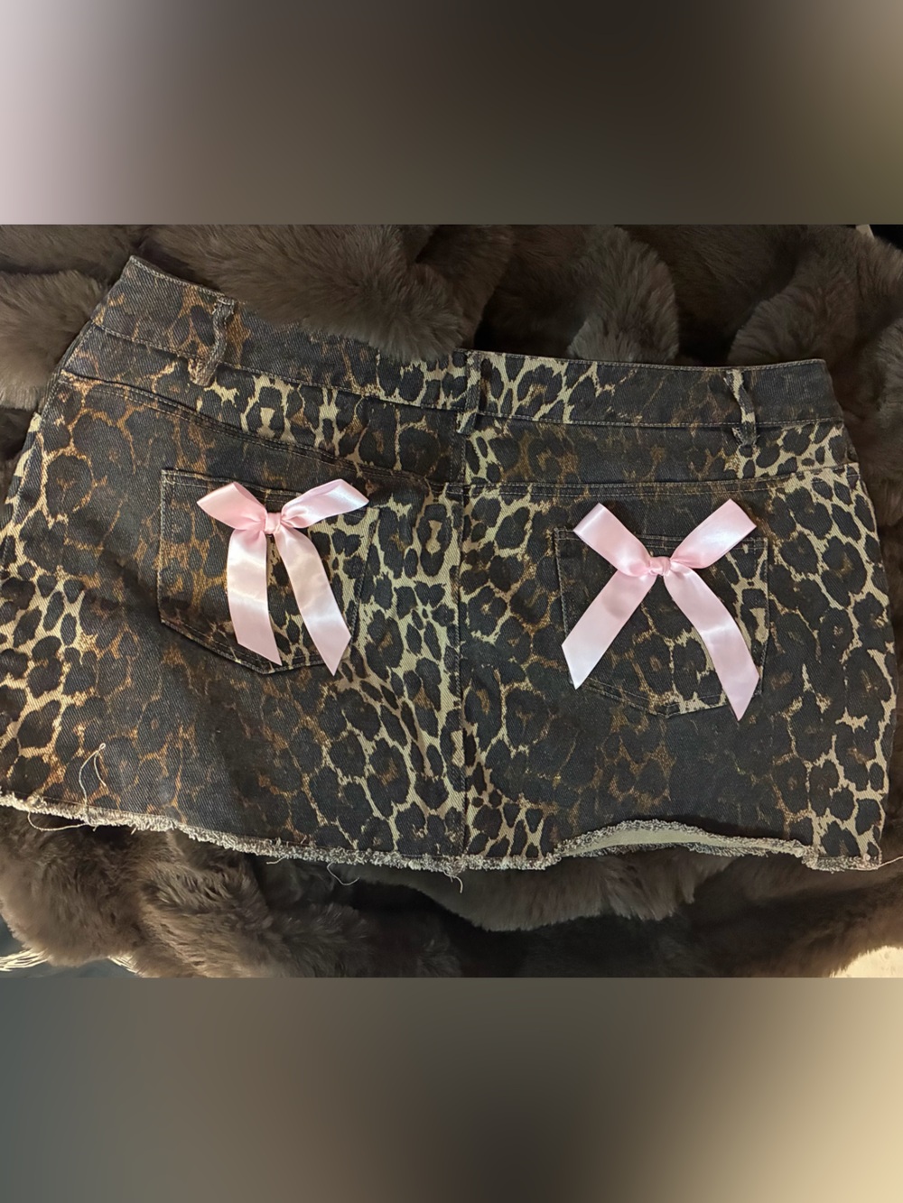 Leopard Print Mini Skirt with Pink Bow Accents